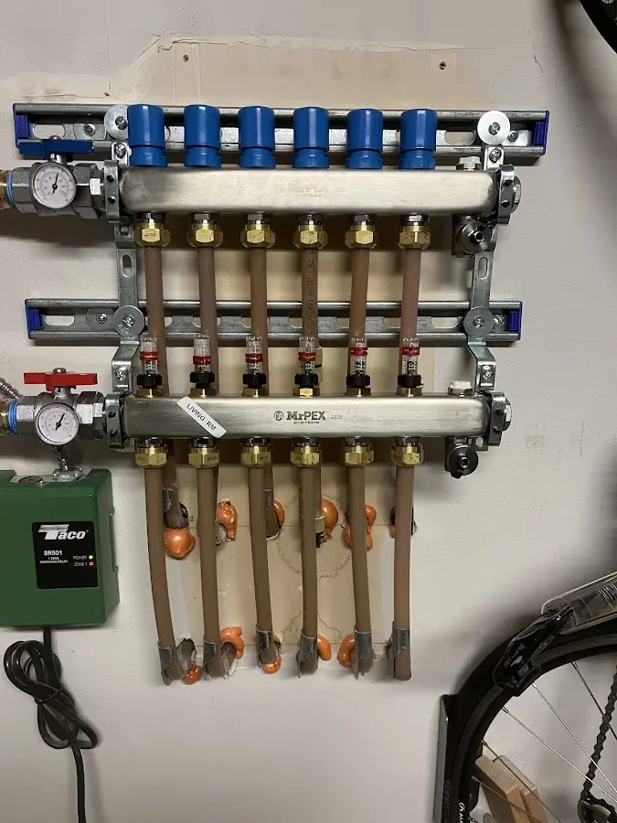 Plumber performing Leak Detection at a residential property in New Boston